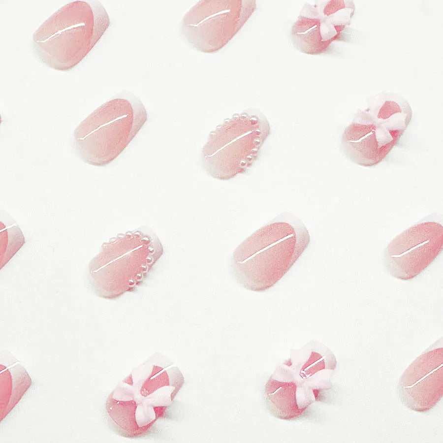 S274 French manicure gel strips with white tips, bow, and tulip designs for short square nails on a blush base.