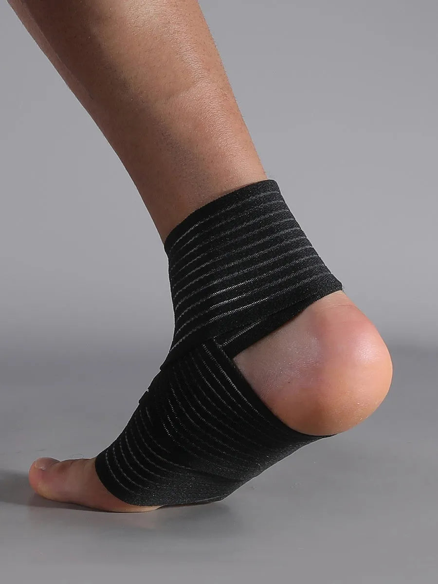Adjustable black sports bandage for ankle support during running and basketball.