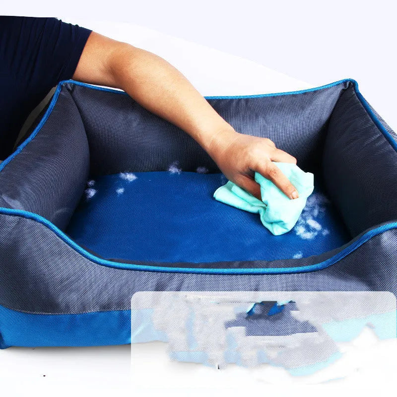 Blue dog kennel pet bed with 1680 Oxford PU coating, removable interior, on a wooden floor