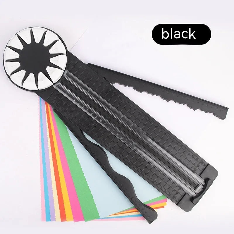 Pink plastic multifunctional 12-in-1 paper cutter and scoring board with size guides.