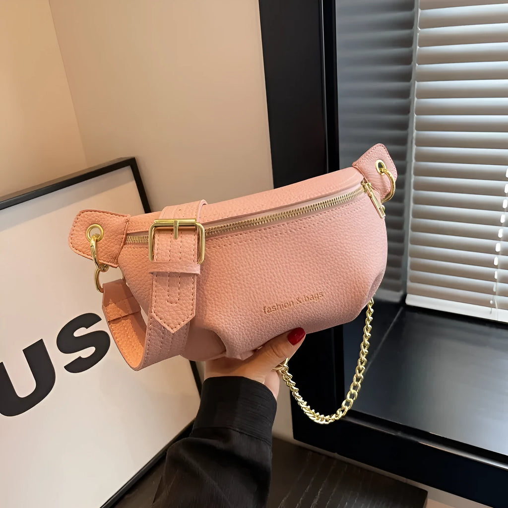 Waist bag with single shoulder design, PU material, medium soft texture, zippered compartment, splicing detail, available in black pink white colours.