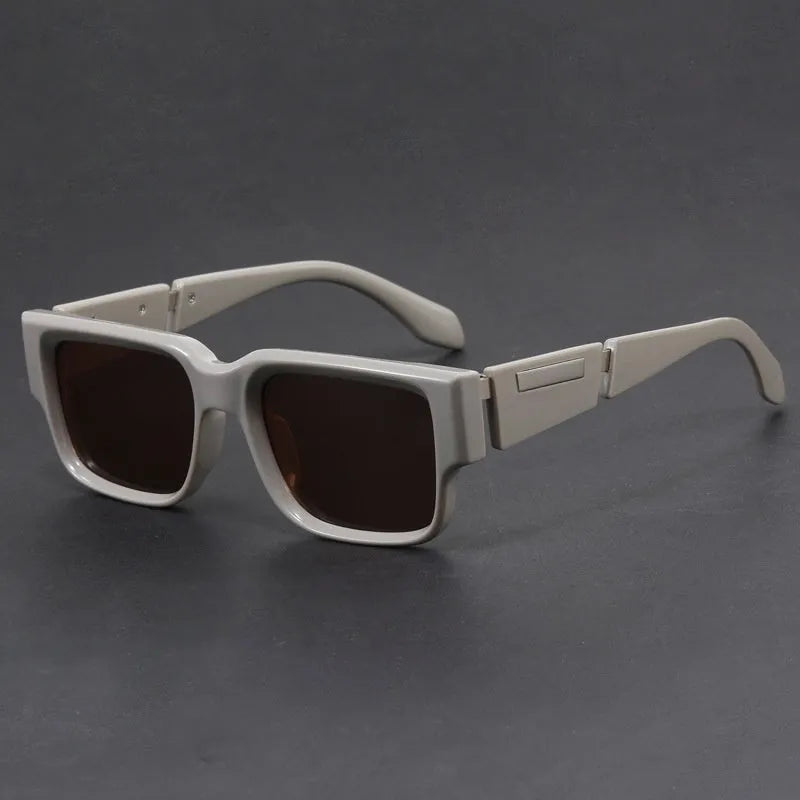 Square thick frame sunglasses with blue frames and grey-blue lenses showing Box style design