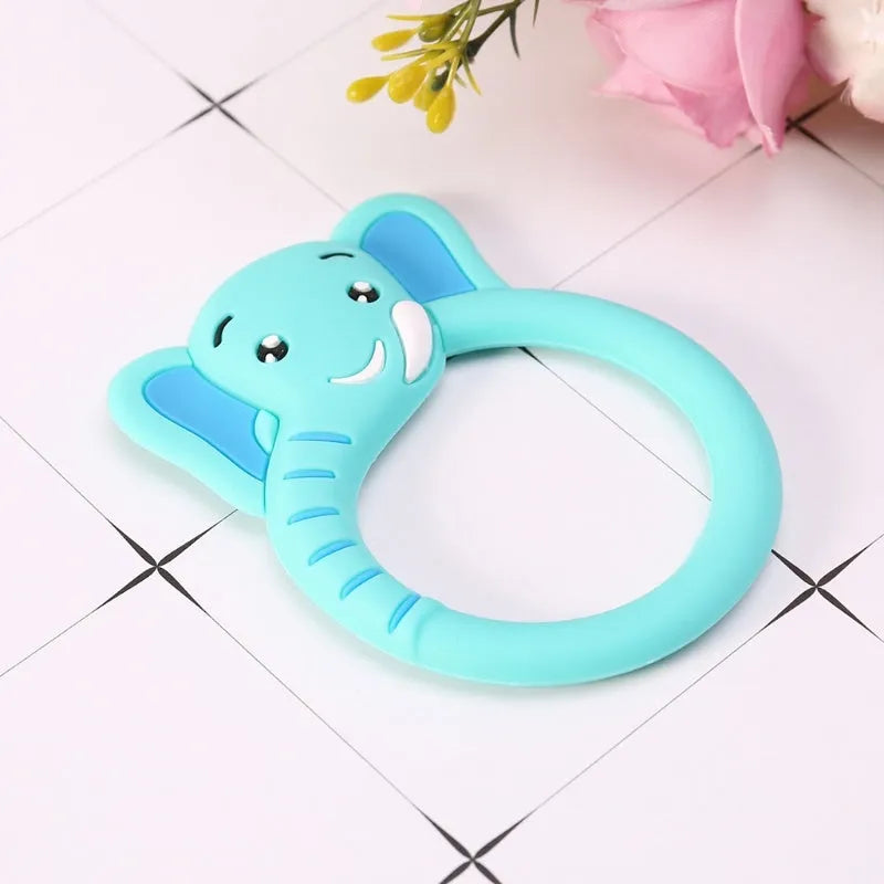 Three baby molar silicone teethers in brown, blue, and yellow on a white background