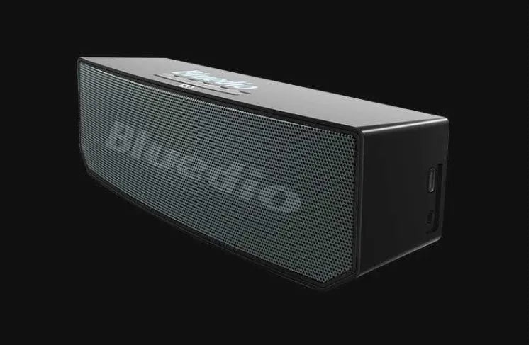 Black BS-6 Bluetooth cloud smart speaker showing front grille and compact rectangular design.
