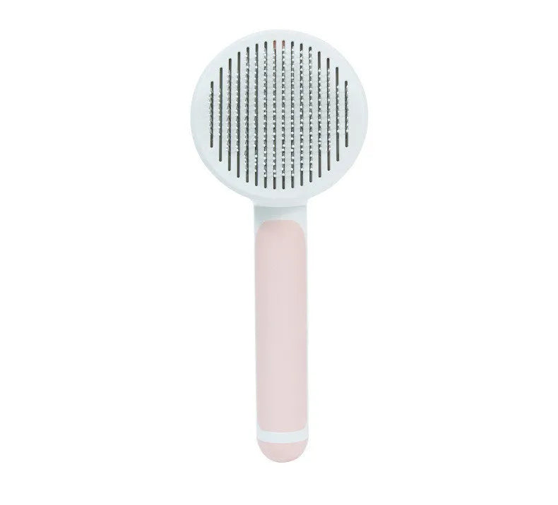 Round handle pet pass-through comb with stainless steel needles and self-cleaning button in pink colour