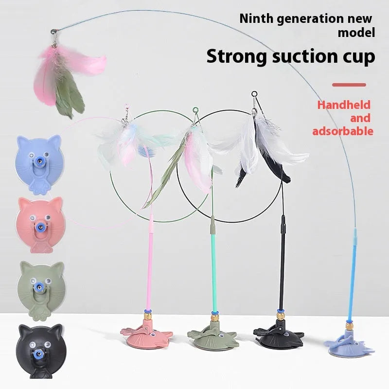 Cat teasing stick with suction cup holder, long brush handle, and bell attachment in various colour options