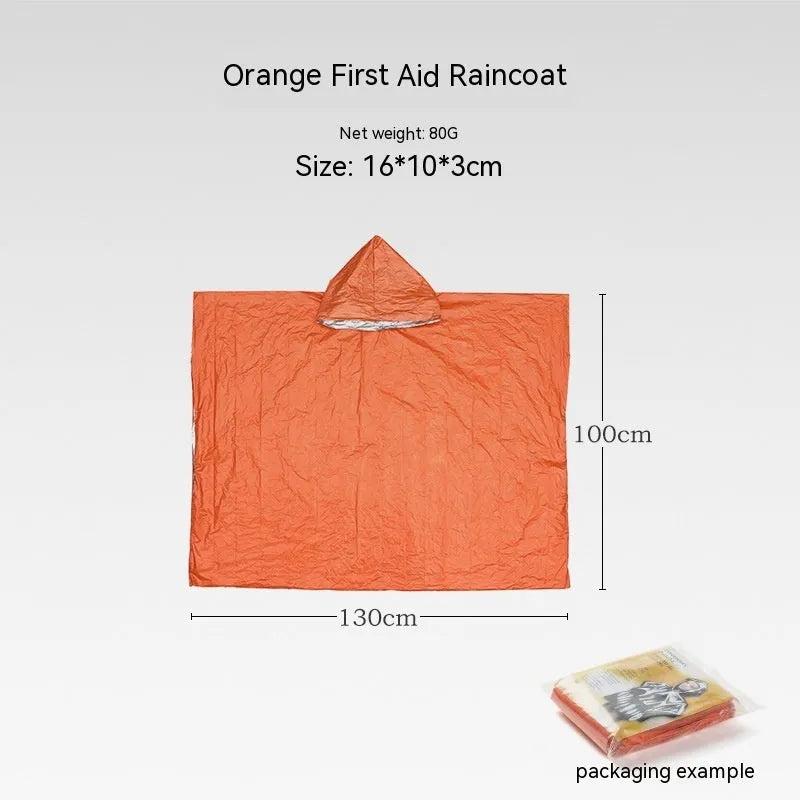 Orange and green emergency tent, sleeping bag, and raincoat kit for outdoor survival.