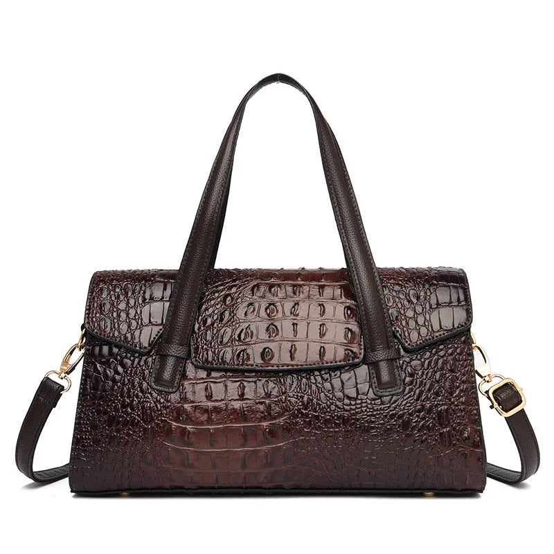 Soft leather messenger bag in horizontal square design with single shoulder strap