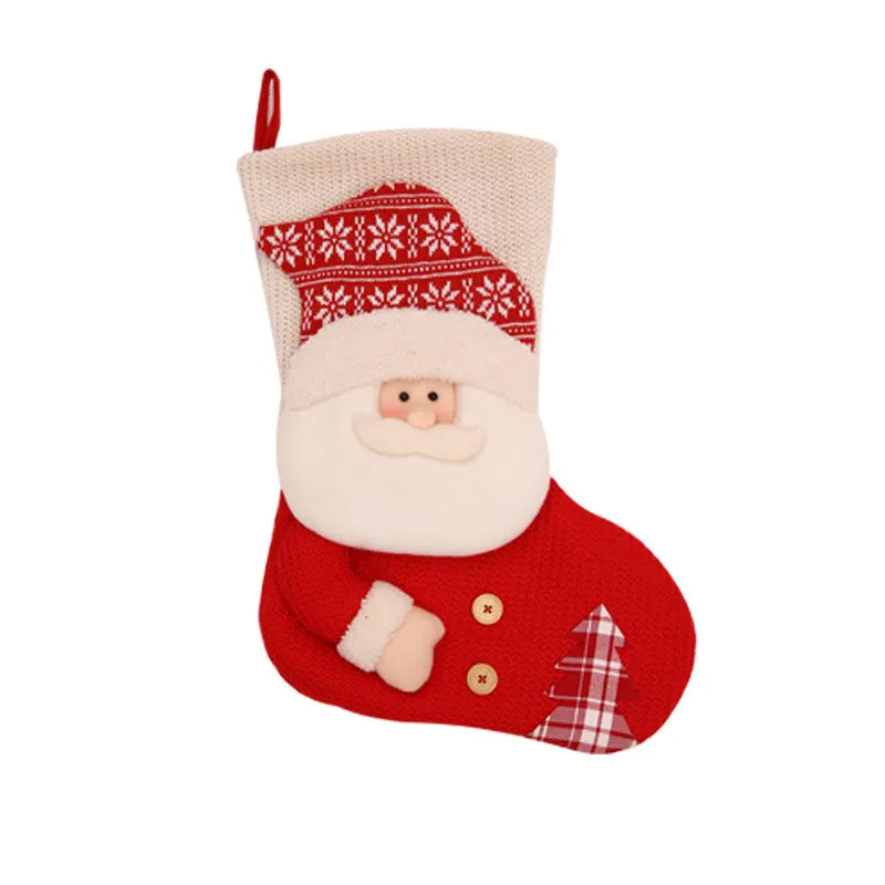 Large red and white knitted Christmas stocking with Santa Claus design hanging on a fireplace