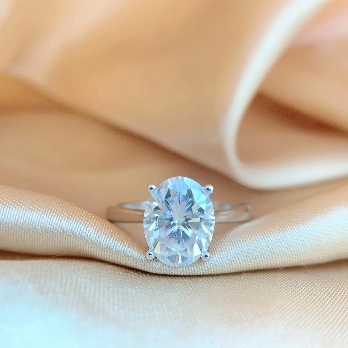 Oval moissanite ring in four-claw setting, D colour, electroplated band, sizes 5 to 9