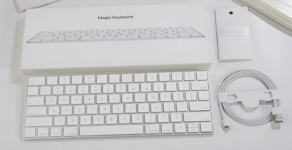 Apple white metal Bluetooth wireless keyboard with ultra-thin design and multimedia function keys
