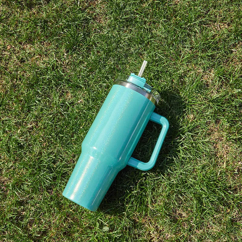 Stainless steel vacuum insulation cup in rainbow gradient colours showing double-layer construction