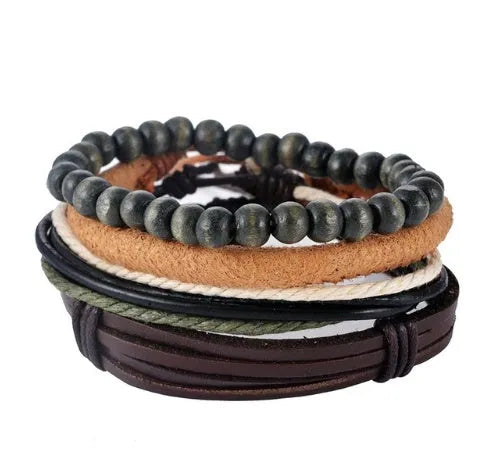Handmade brown leather wrap bracelet with wooden beads and braided cord on a wrist.