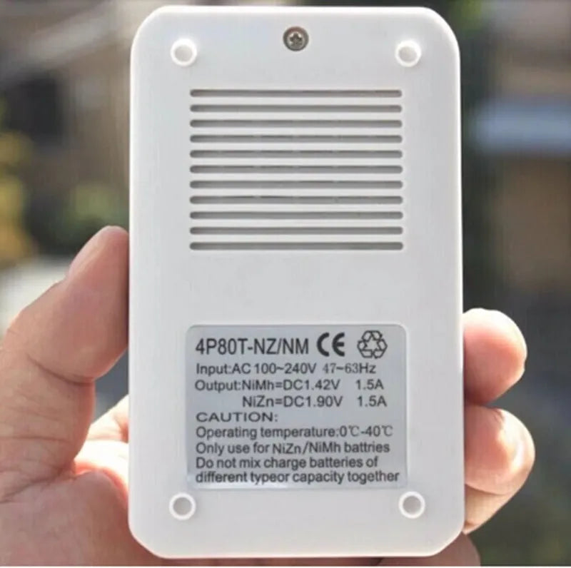White rechargeable battery charger for 1.6V nickel-zinc batteries with four batteries and US plug