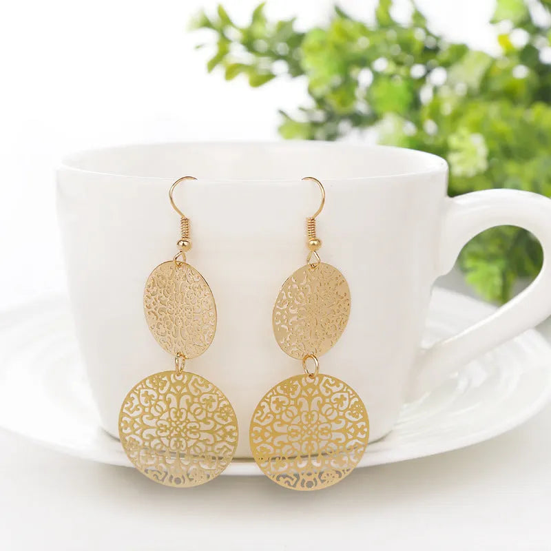 Women's round hollow gold dangle drop earrings in zinc alloy, 4.5 by 8 centimetre size
