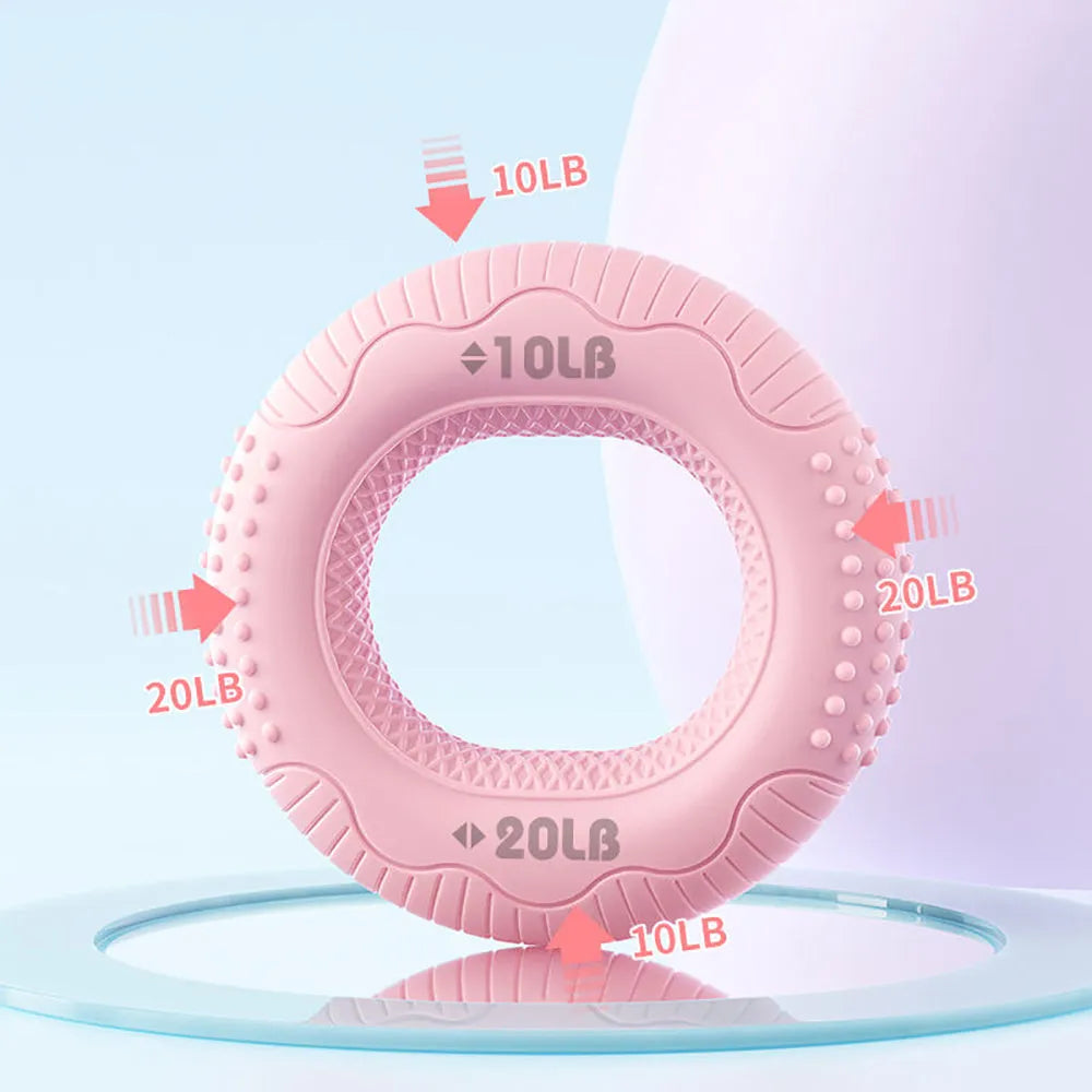 Silicone hand grip ring in five colours showing textured surface and compact 7.4cm size for finger and forearm strength training