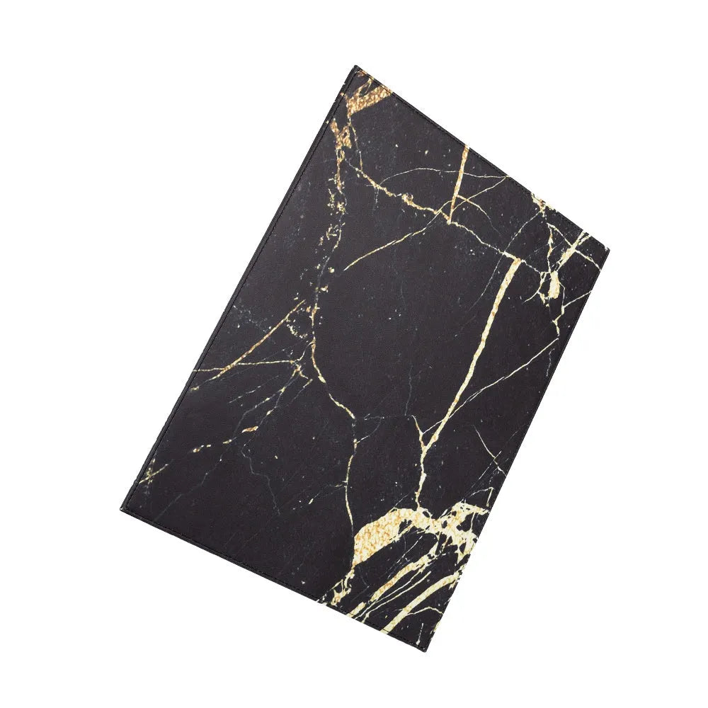 Anti-radiation printing tablet pad in black, gold, blue, and green colour options on a desk.