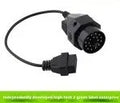 OBD2 adapter cable with a BMW 20-pin connector on one end and a standard 16-pin OBD2 connector on the other.