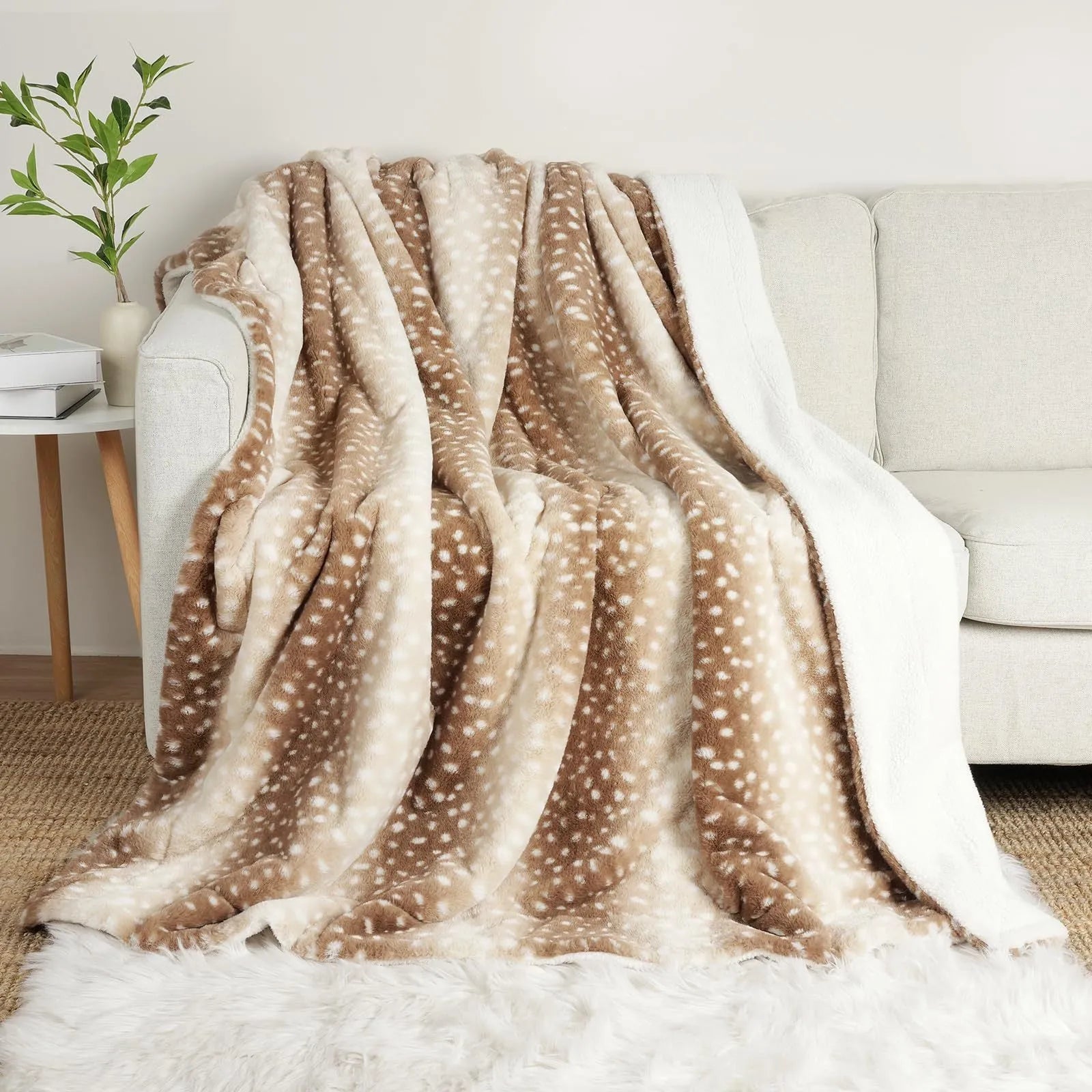 White flannel blanket with animal stripe pattern on a sofa
