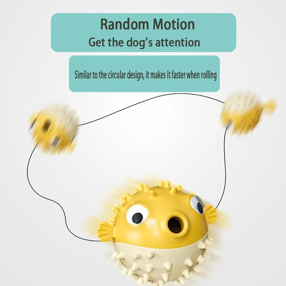 Green fish-shaped interactive dog toy with treat hole and textured surface.