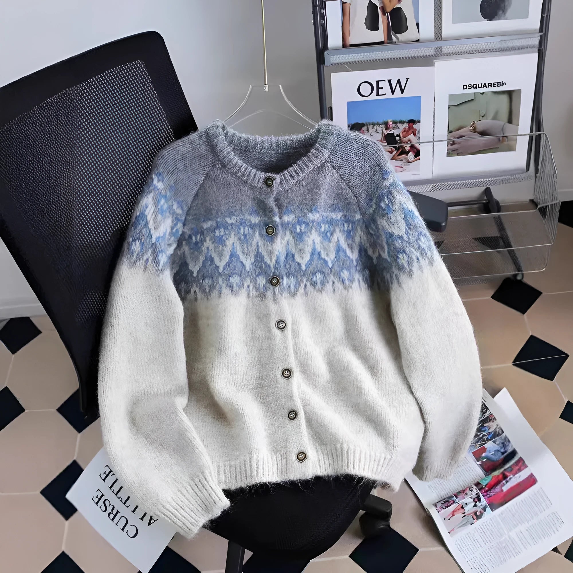 Women's beige jacquard knit sweater coat with a loose fit and long sleeves.