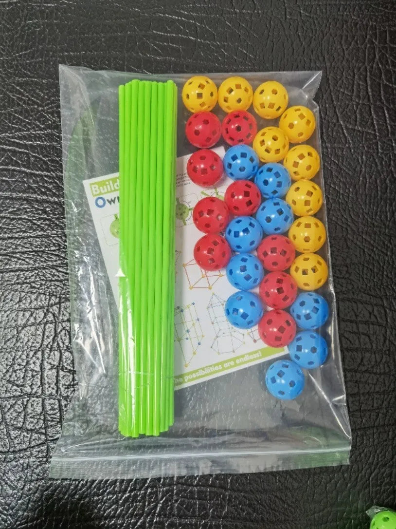 Luminous children's fort building kit with plastic sticks and connector balls for constructing castles and play tents