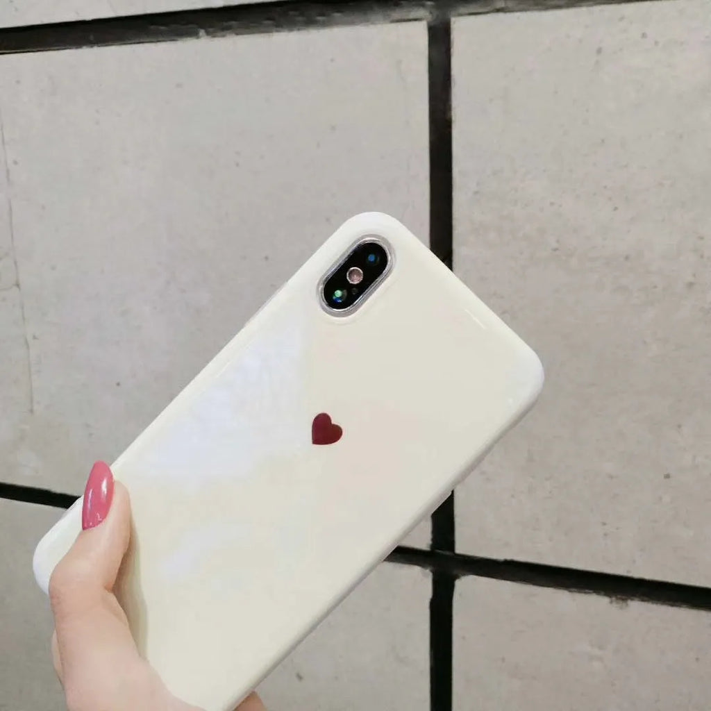 Transparent blue light blocking phone case for iPhone on a white background.