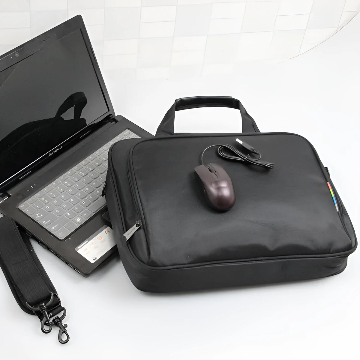 Black one shoulder computer bag in nylon, 14in 15in 17in sizes, with briefcase function and air cushion shock absorption
