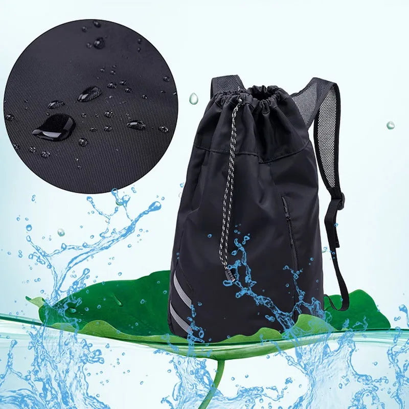Black nylon backpack gym bag, 30 x 17 x 56cm, with zip pocket and three carry modes