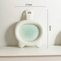 Ceramic cat bowl in a choice of colours with a shallow plate design for pet food.