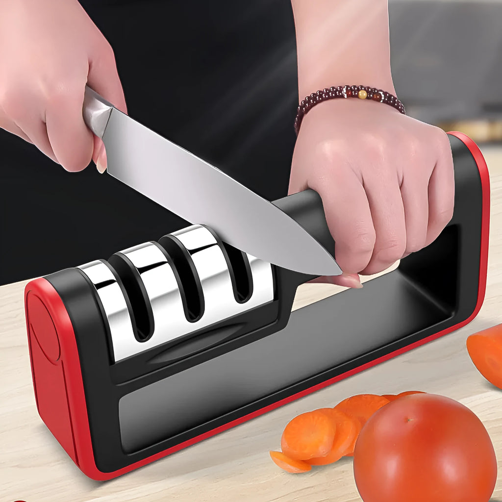 Black and red professional three-stage diamond knife sharpener on a kitchen countertop