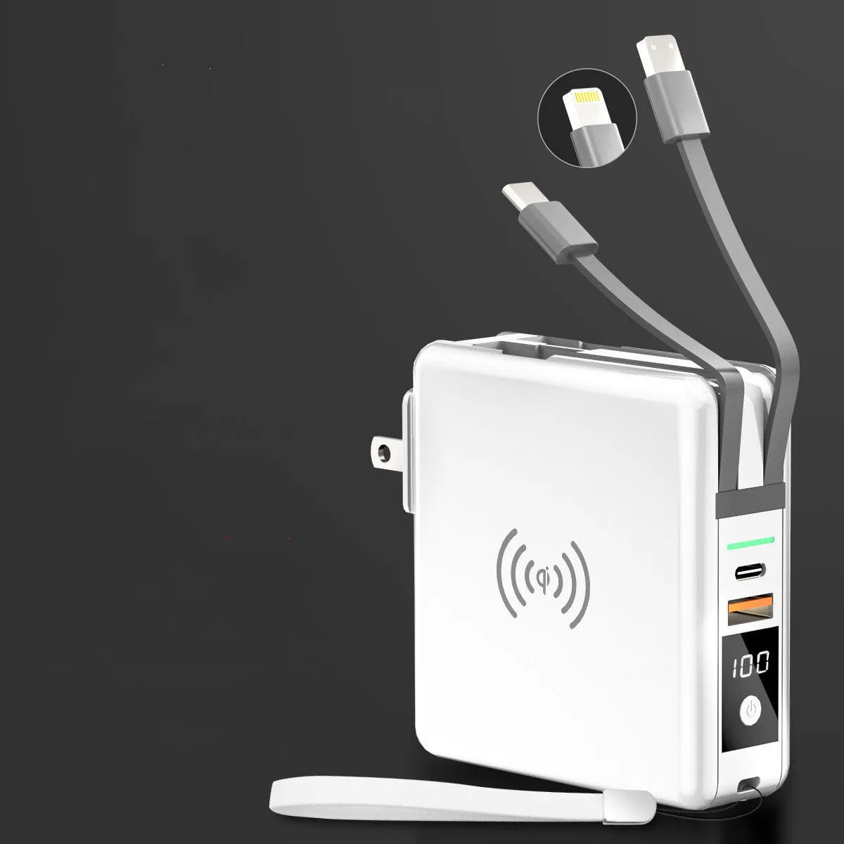 Black Super QI power bank with folding AC plug unfolded, showing wireless charging surface on top.
