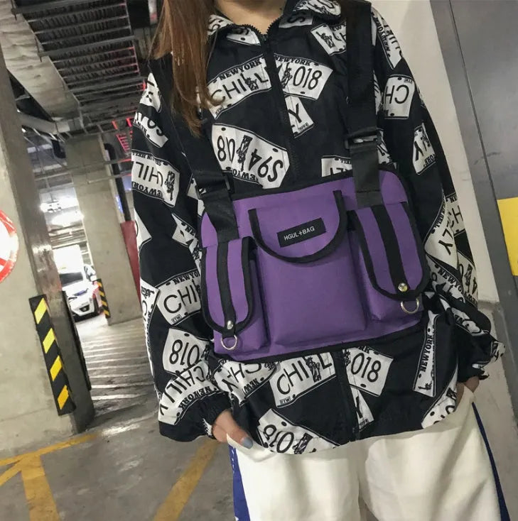 20-35L nylon casual sports backpack with zip pockets, double straps, and soft handle in Black, Camouflage, Gray, or Purple.