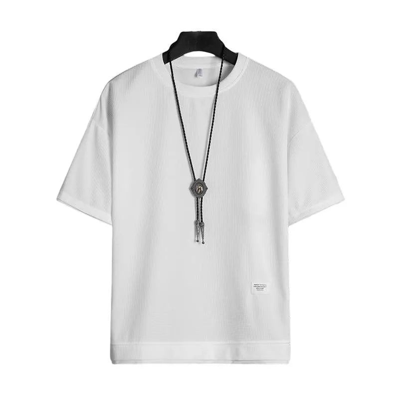 Half sleeve loose pullover top in polyester, available in seven colours and sizes M to 5XL