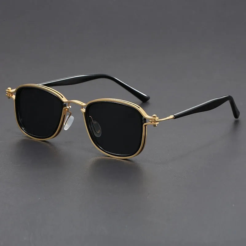 Retro square sunglasses with metal decorative patterns and tinted lenses in a two-tone colour finish.