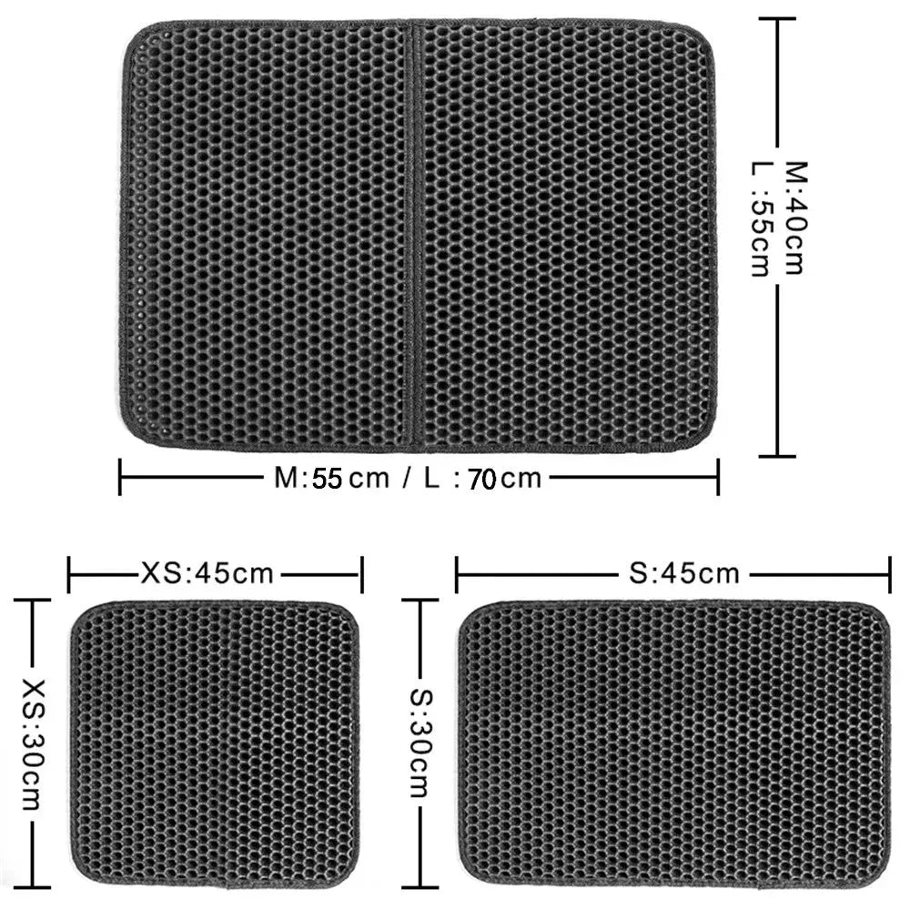 Black EVA foam cat litter pad with honeycomb design beside litter box