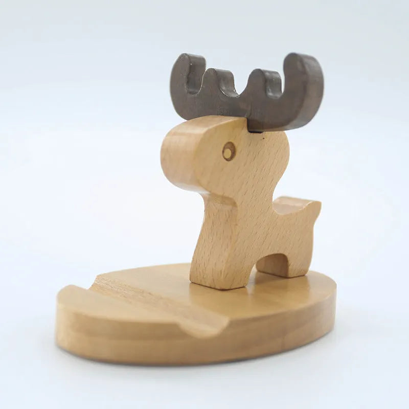 A decorative resin mobile phone stand holding a smartphone, shown in an animal design variant.
