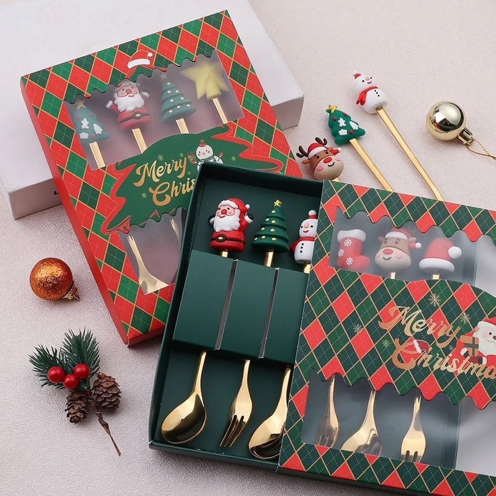 Red stainless steel Christmas spoon and fork set with tree and snowman patterns on handles