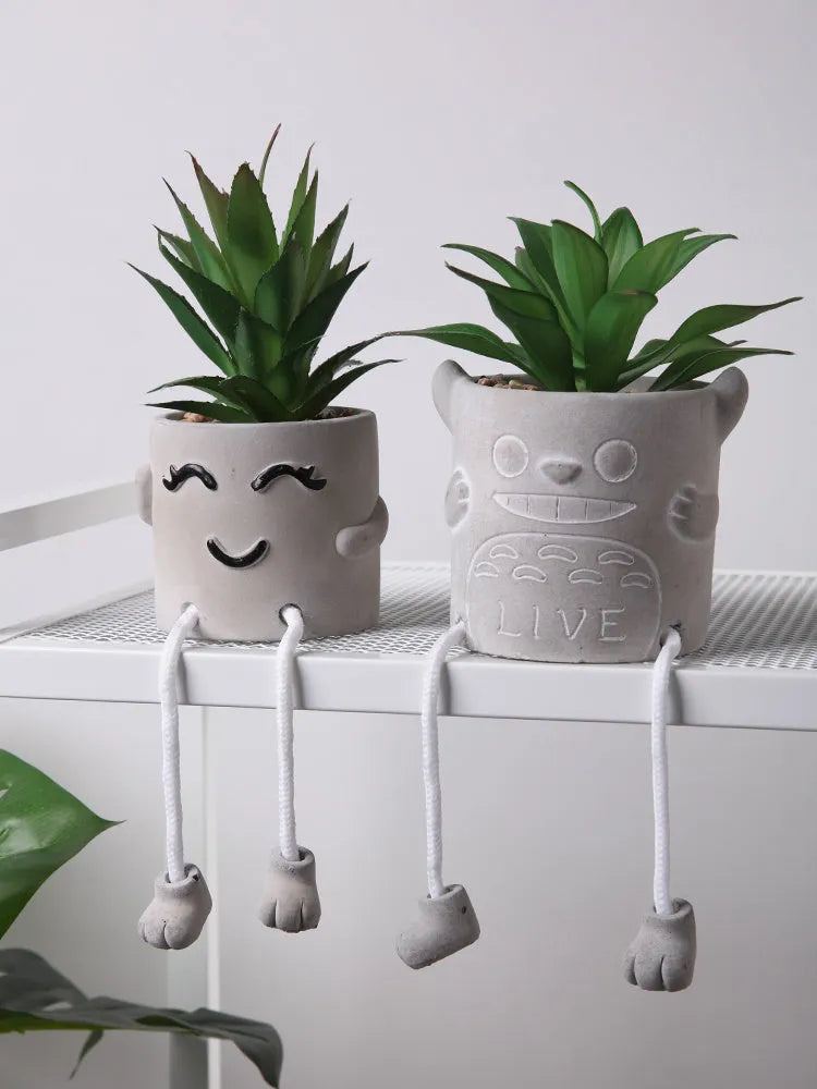Cement potted plant with hanging feet creative pendant doll in two colour options