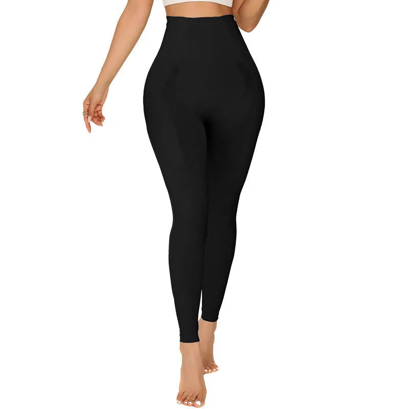 Women's black seamless yoga trousers with high waist, showcasing abdominal support and adjustable design for fitness.