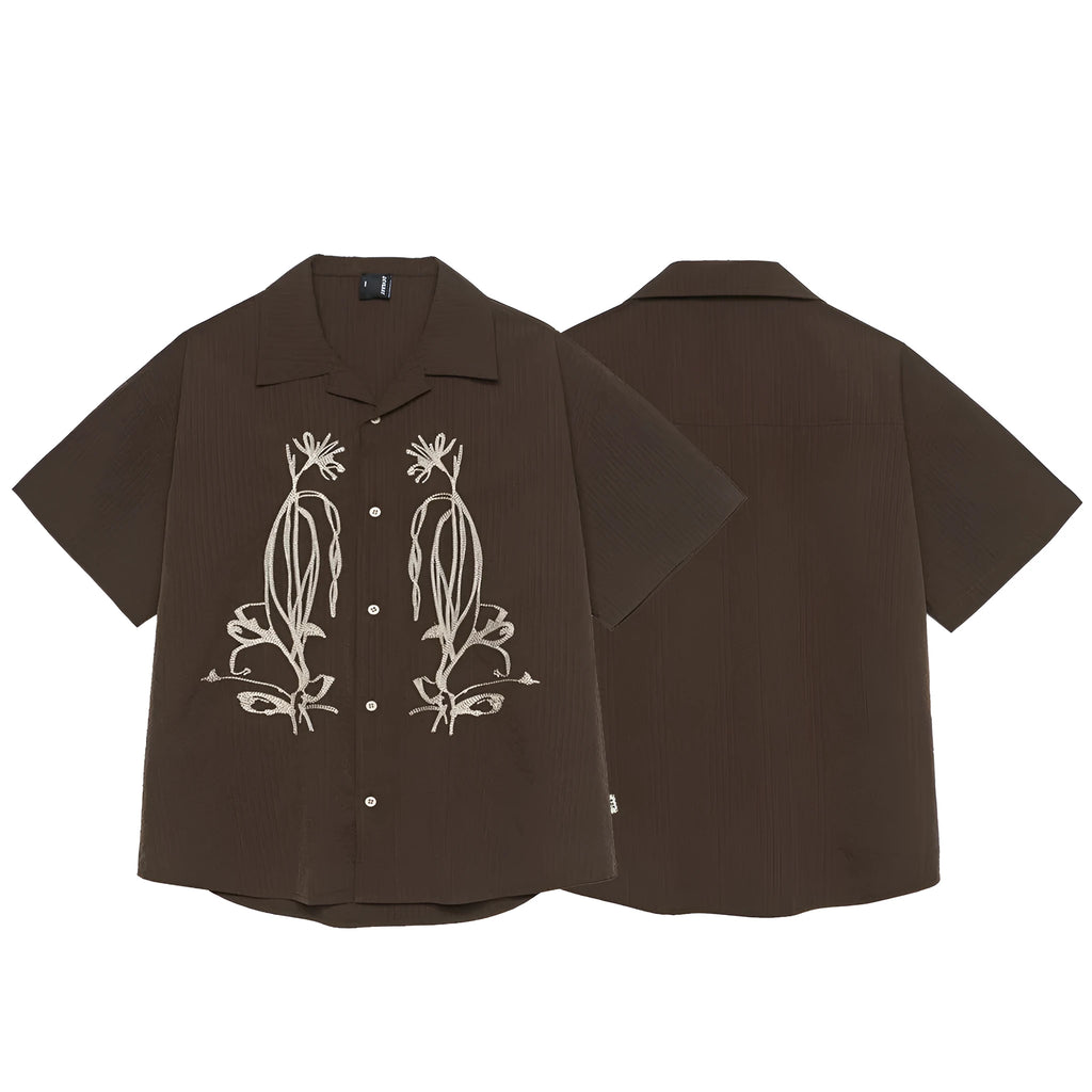 Brown striped men's short sleeve outdoor shirt with Cuban collar on a mannequin.