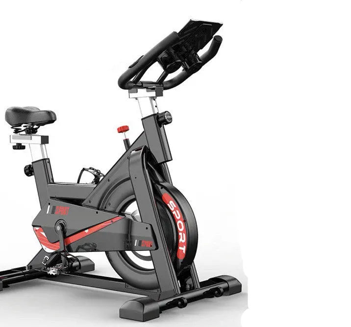Black upright spinning bike with steel frame and console display for home cardio cycling