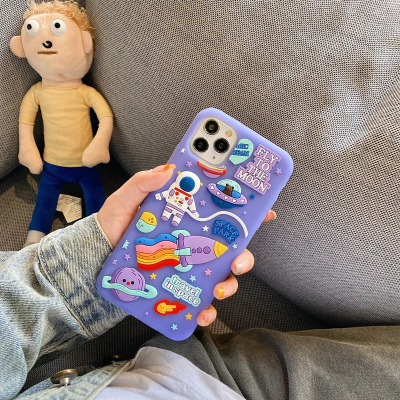 Purple silicone iPhone case with cartoon astronaut graphic for models 7, 8, X, and 11