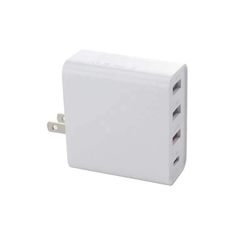 Black four-port USB-C wall charger with UK, US, EU, and AU plug adaptors on a white background.