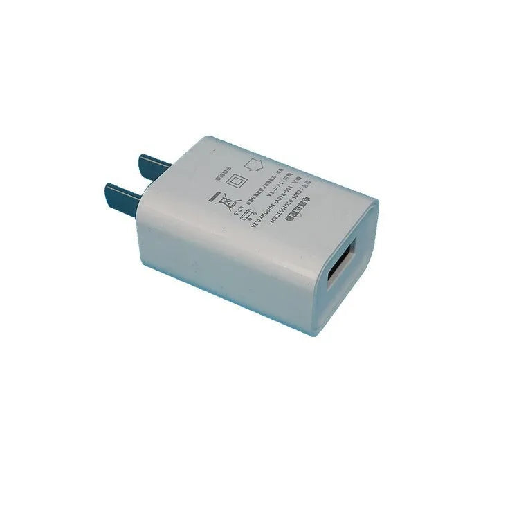 White standard USB power adapter charger with 5V1A output and CE FCC certifications