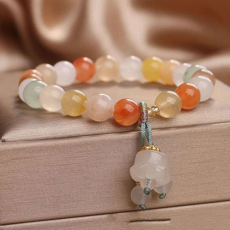 Natural Jinsi Jade beaded bracelet for women with round beads and lily pendant in jade colour