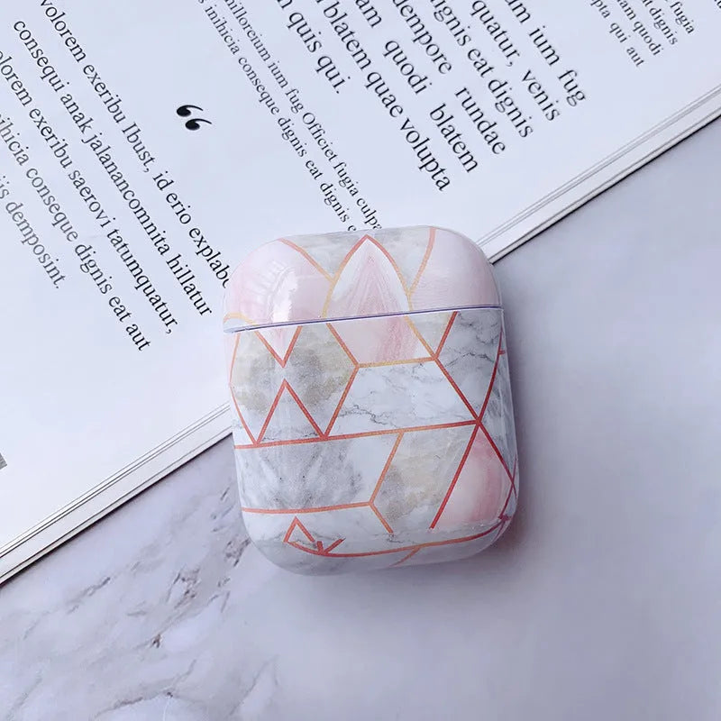 White marble patterned hard PC protective cover for AirPods 1 and AirPods 2 charging case.