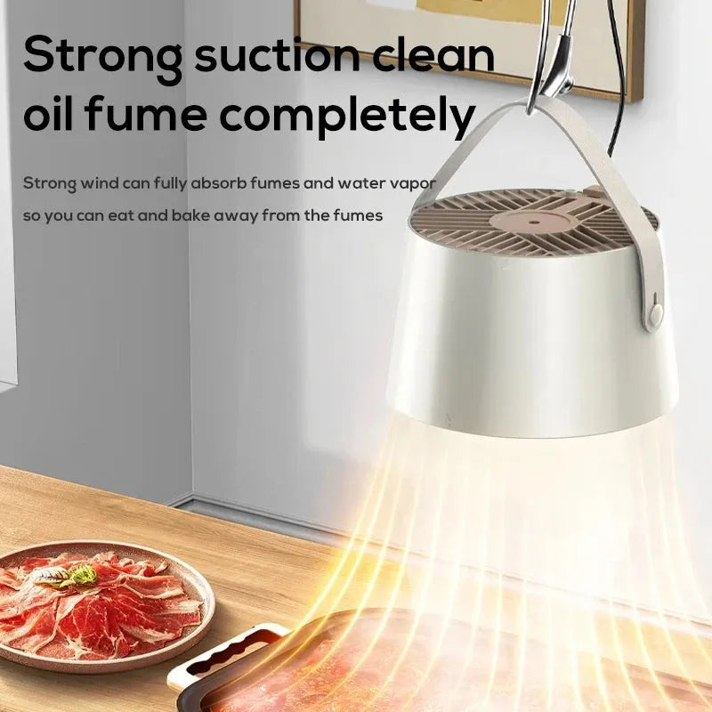 Milky white portable USB desktop exhaust fan with tripod stand and removable filter screen.
