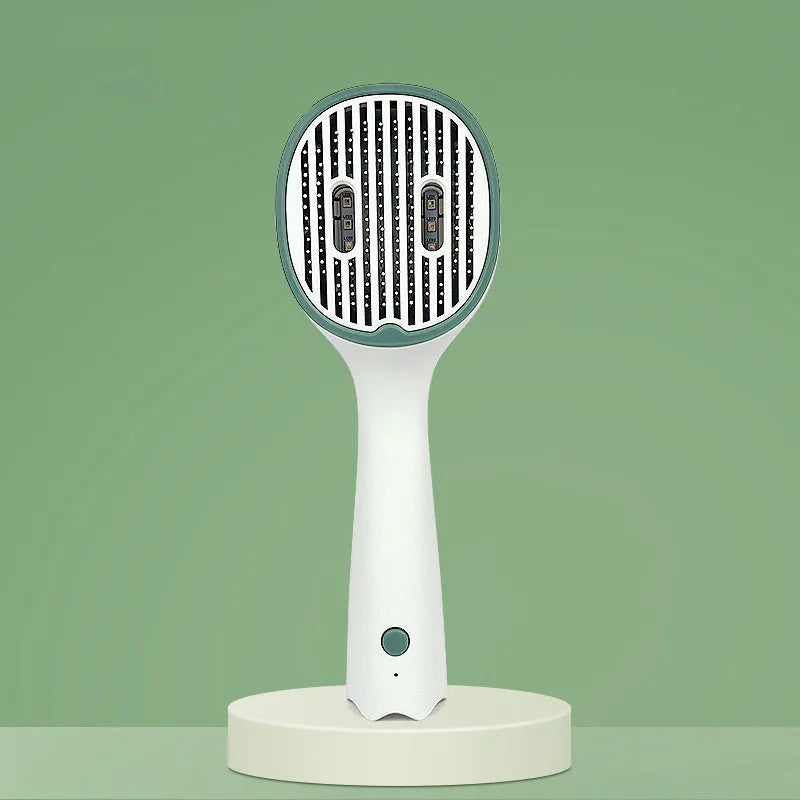 Dark green pet grooming comb with UVC sterilisation light, slicker brush, and needle comb on a grey background.
