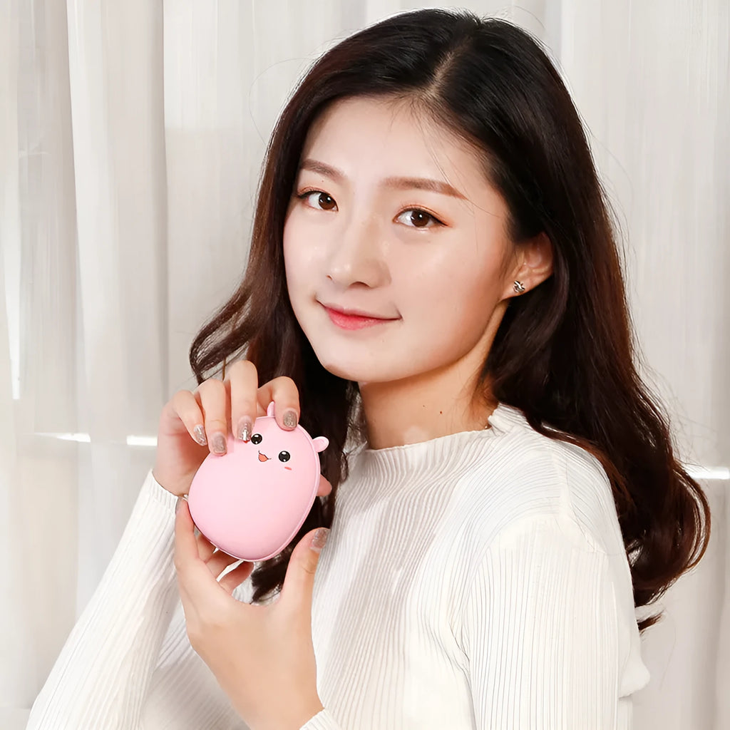 Compact multifunctional hand warmer in pink with aluminium alloy shell, 2600mAh power bank function